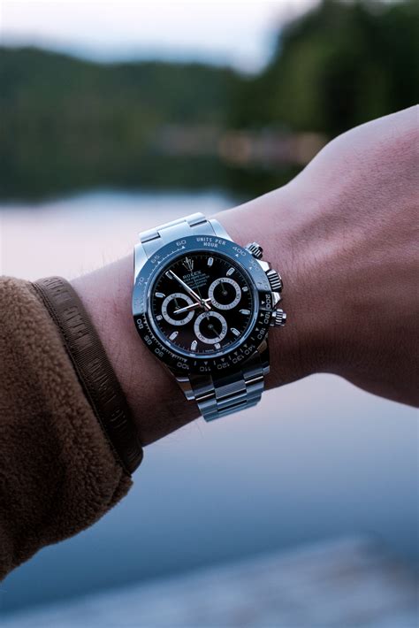 rolex sub daytona on wrist